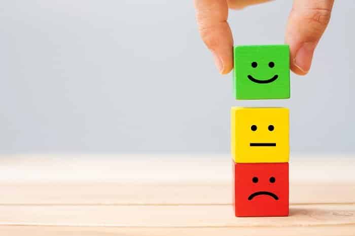 emotion face symbol on wooden cube blocks service 2021 09 08 17 58 18 utc